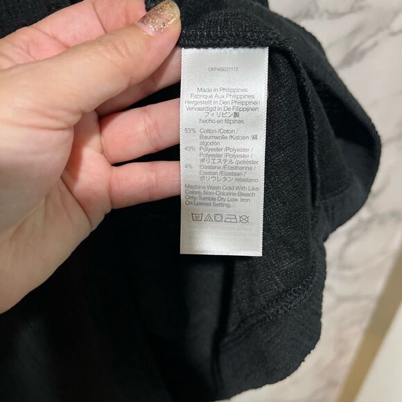 MADEWELL BLACK CROSS-FRONT FLUTTER-SLEEVE FIT & FLARE MINI DRESS - Picture 8 of 10